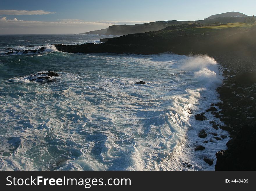 Ocean coast with surf waves. Canary Islands. Ocean coast with surf waves. Canary Islands