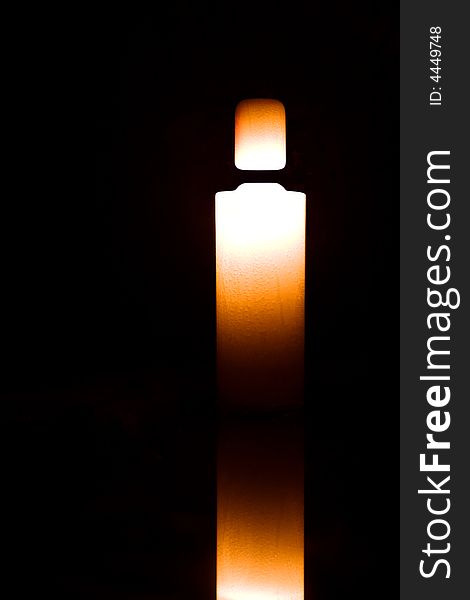 Light Candle Isolated On Black