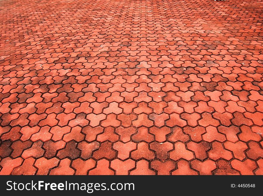Brick pavement, not the ordinary rectangular shape