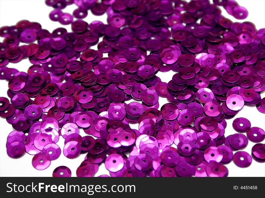 Purple confettis on the isolated background