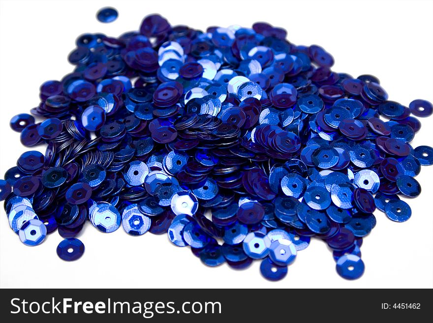 Blue confettis on the isolated background