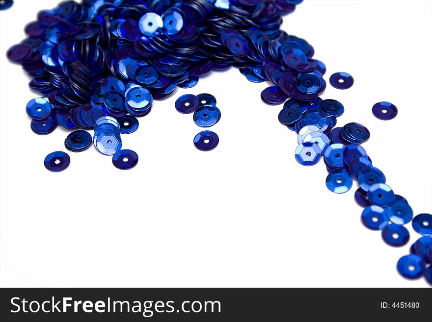 Blue confettis on the isolated background