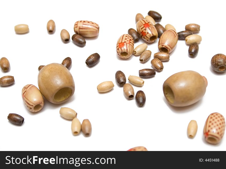 Wooden rosary on the white isolated background