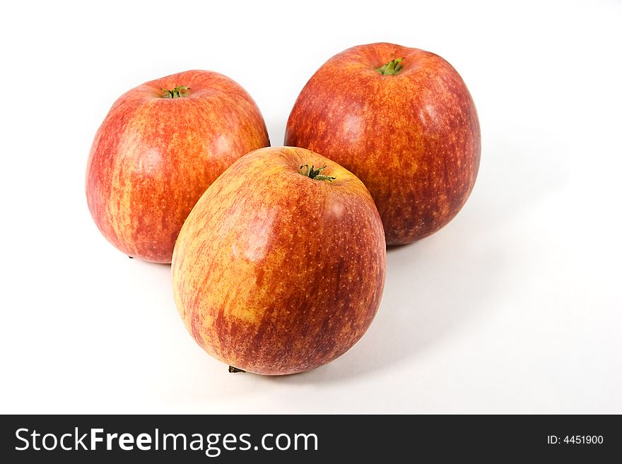Three red apples isolated on white background. Three red apples isolated on white background