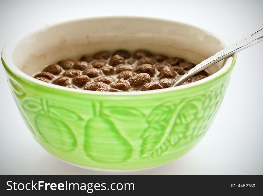 Cup of chocolate cereal isolated on white. Cup of chocolate cereal isolated on white