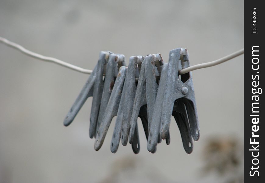 Clothespins on a cord in a court yard for drying linen