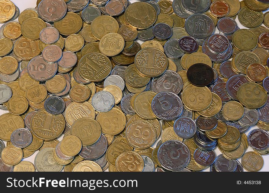 Many the Ukrainian coins in the white background. Many the Ukrainian coins in the white background