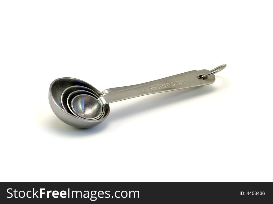 Isolated shot of a set of measuring spoons on a white background.