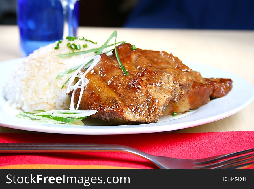 Plate of pork spare ribs with rice