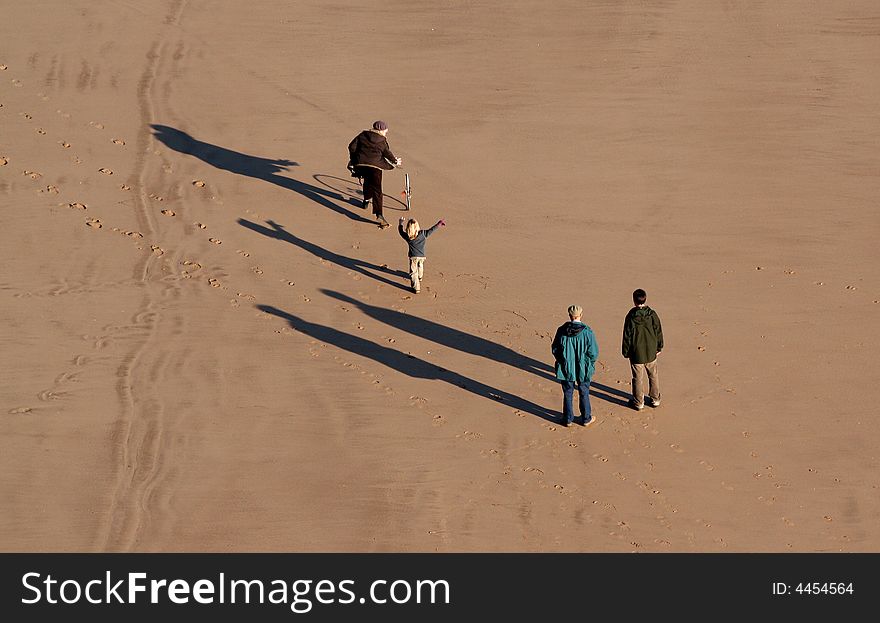 Family on a sandy beach. Family on a sandy beach