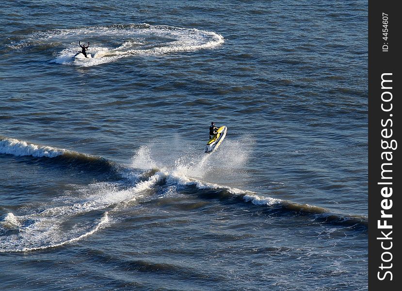 Ski jet jumping a wave. Ski jet jumping a wave