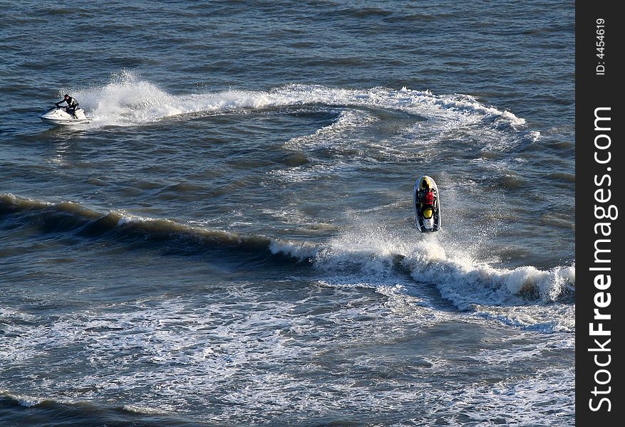 Ski jet jumping a wave. Ski jet jumping a wave