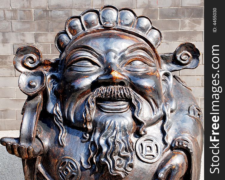 The ceramic sculpture of the Chinese God of salary and position,Nanfeng Ancient kiln, Foshan,Guangdong,chinaã€‚