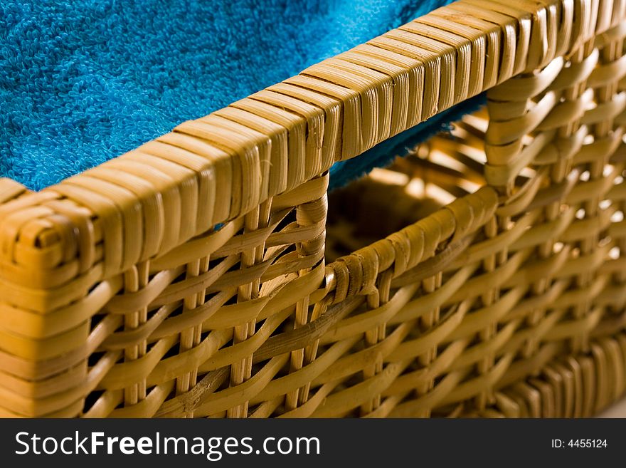 Cyan towel in a basket. Cyan towel in a basket.