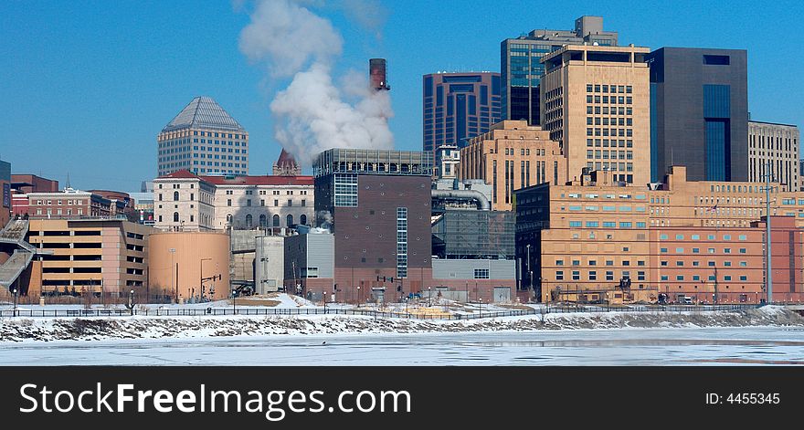 A picture of St. Paul skyline from across frozen river. A picture of St. Paul skyline from across frozen river