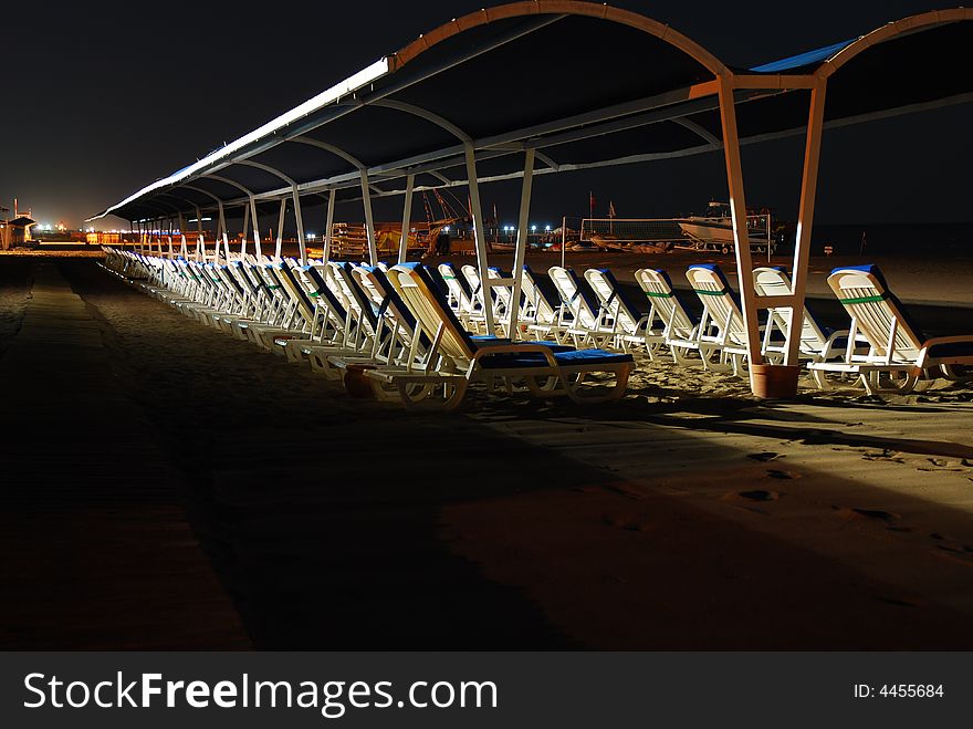 Hight beach and  white lounges