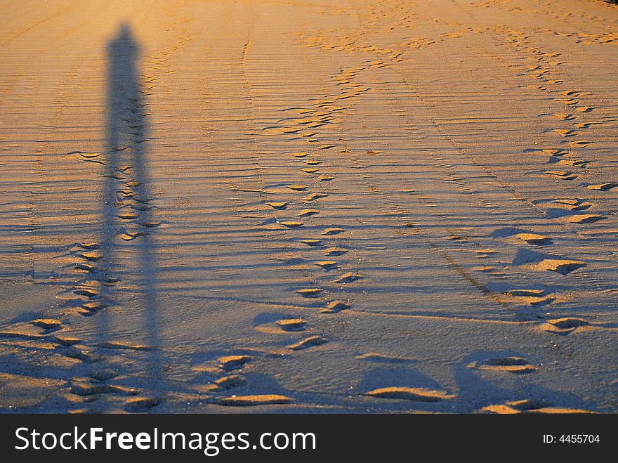 Shade on a beach and more footstep