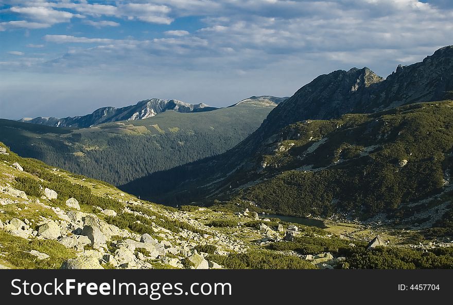 Background natural Great mountain landscape with white clouds and deep blue sky. Background natural Great mountain landscape with white clouds and deep blue sky