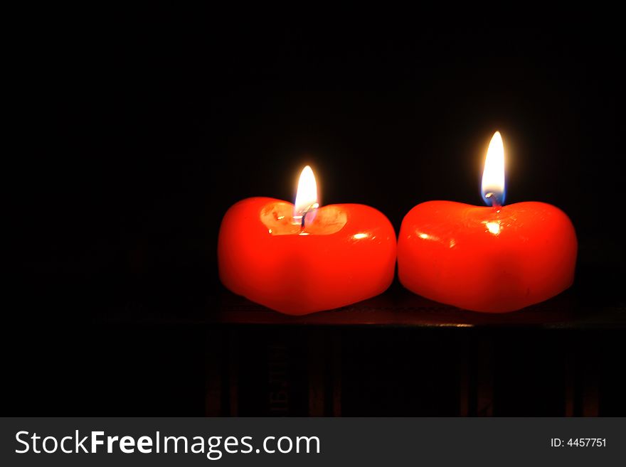 Two candles in form heart