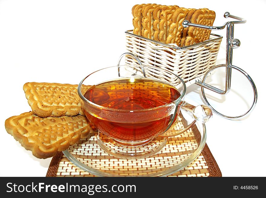 Bicycle whith cookies and a cup of tea. Bicycle whith cookies and a cup of tea