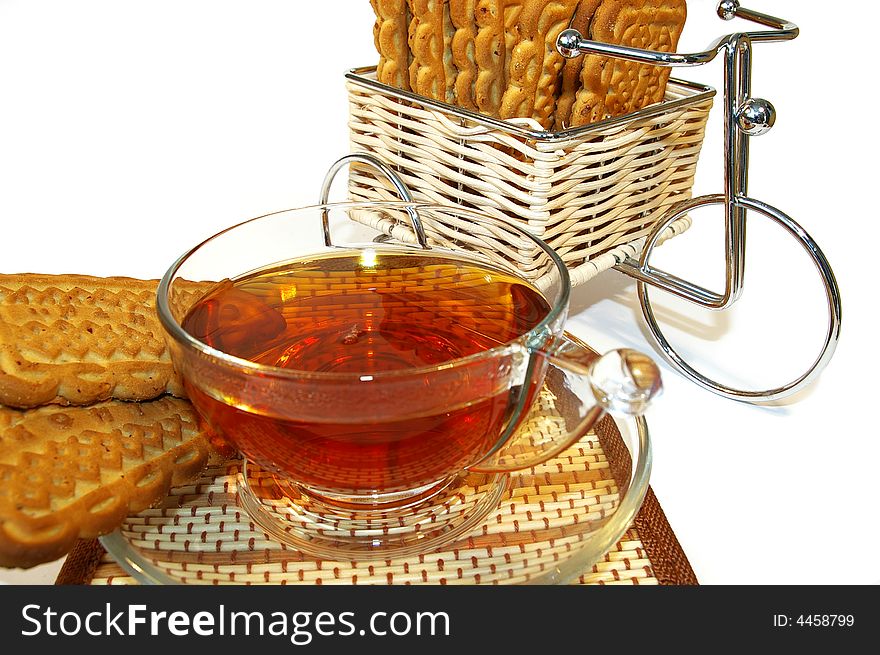 Bicycle whith cookies and a cup of tea. Bicycle whith cookies and a cup of tea