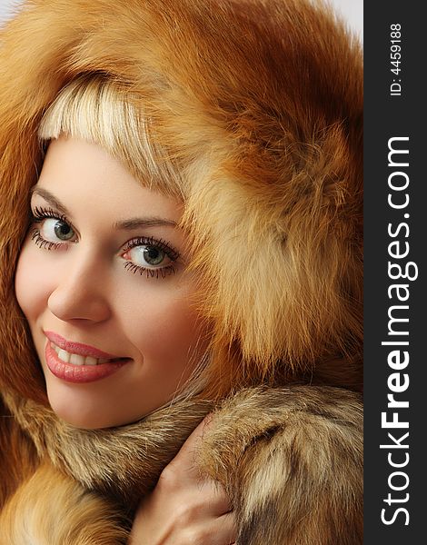 Portrait of the nice girl in fur