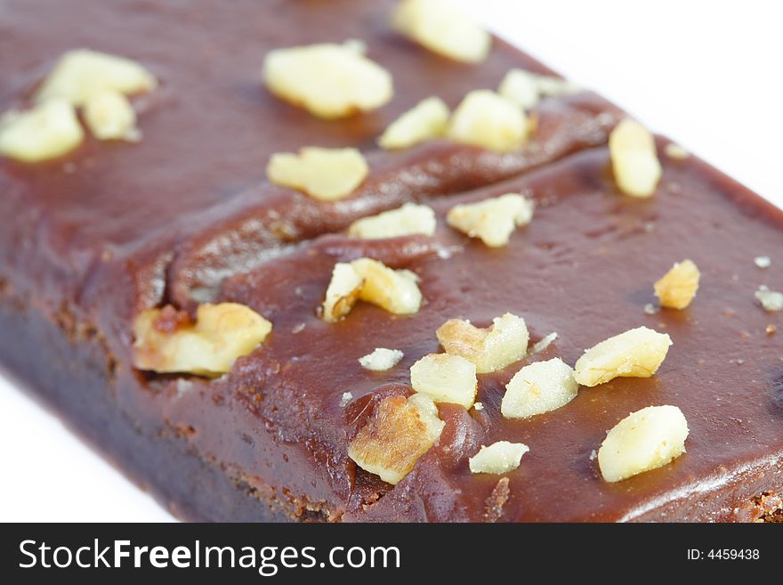 Brownie with nuts on top.