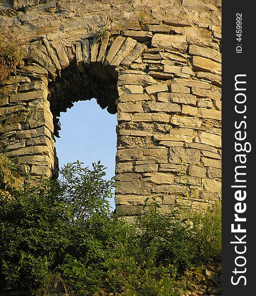 Ancient stone arch in a wall