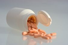Medicine Pills With A White Bottle Royalty Free Stock Photo