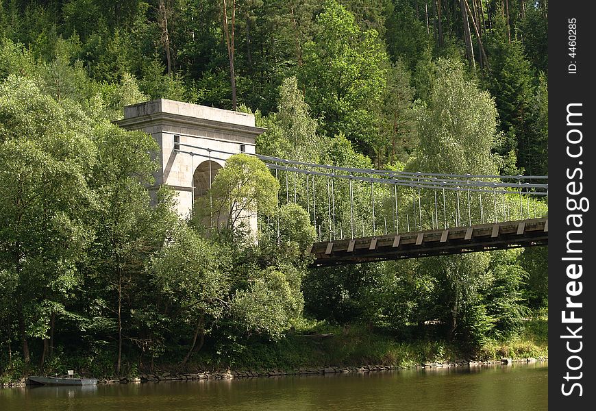 Chain bridge across the river Luznice