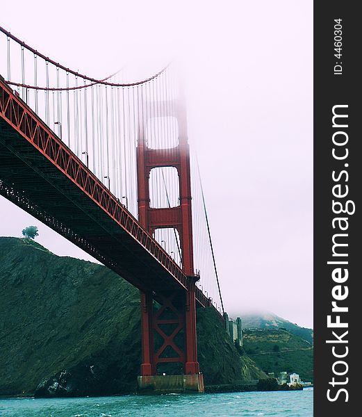 The Golden Gate Bridge on a foggy day.