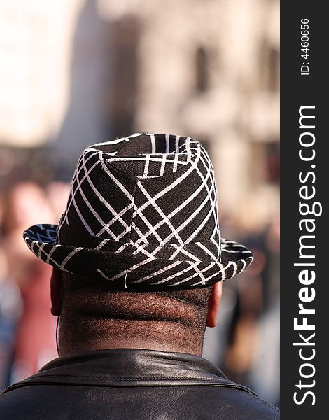 Man in black and white hat london. Man in black and white hat london