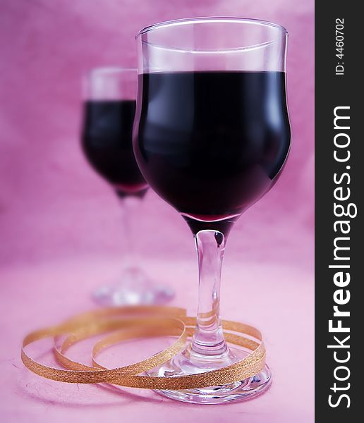 Two glasses of red wine in a party