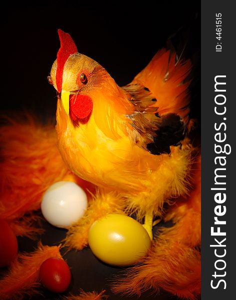 Hen and eggs in easter decorations.
