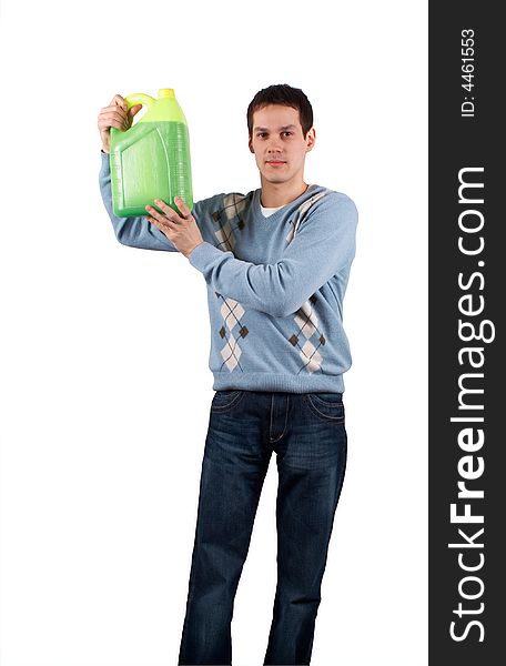 Young man with green jerrican isolated on white