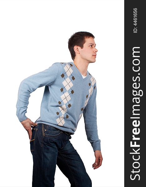 Young man posing with hand on buttock. Young man posing with hand on buttock