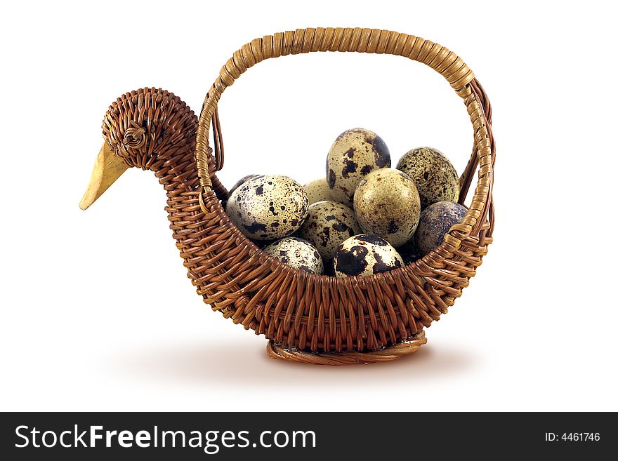 Easter basket with eggs isolated on white