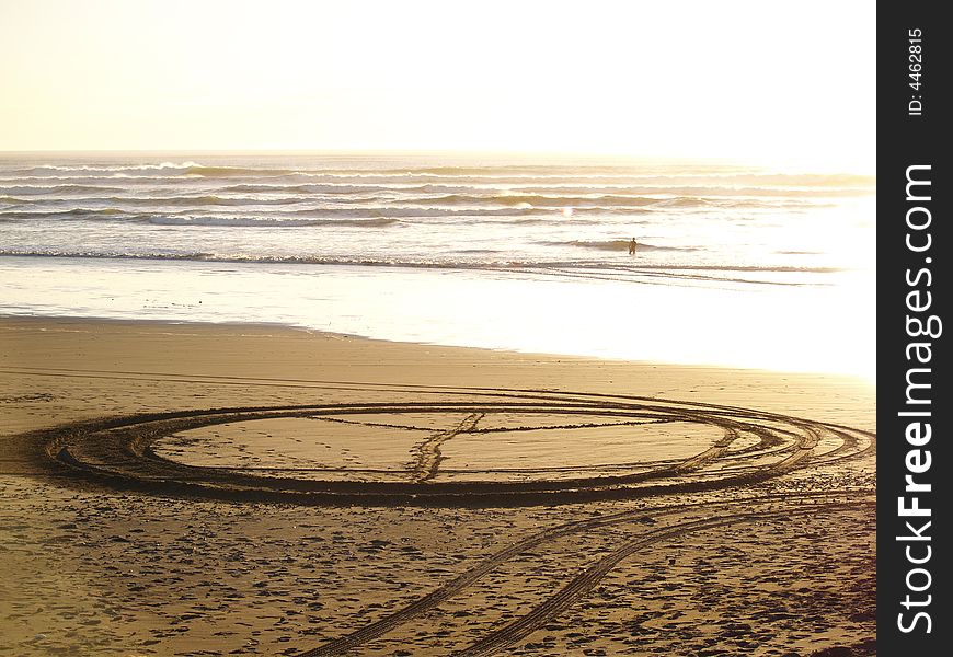 Tyre prints on ocean beach. Tyre prints on ocean beach