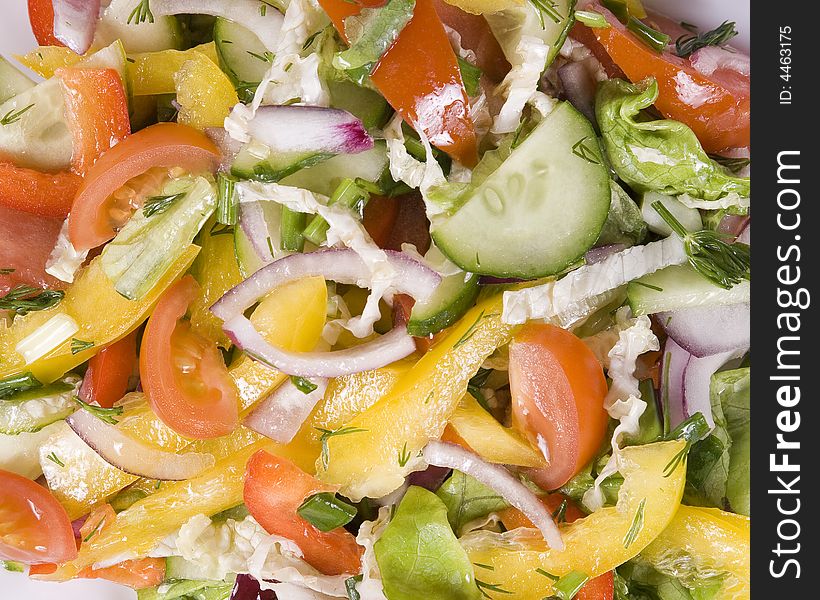 Background from fresh, appetizing vegetable salad. Background from fresh, appetizing vegetable salad.