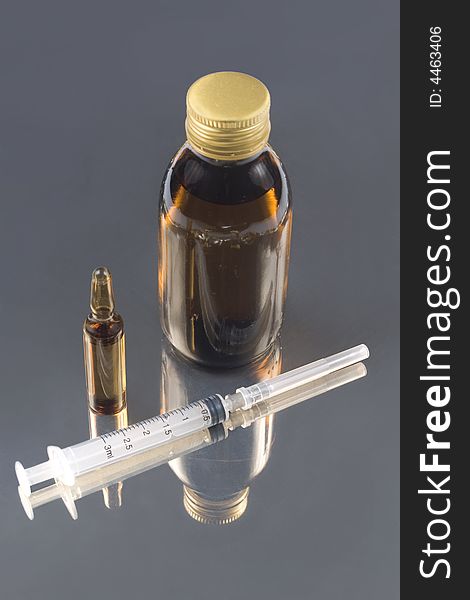 Brown Medical Phial , Bottle And Syringe