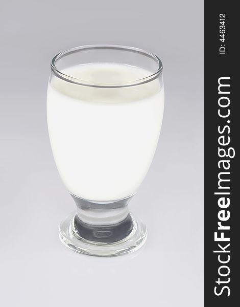 Glass of milk isolated on a white background