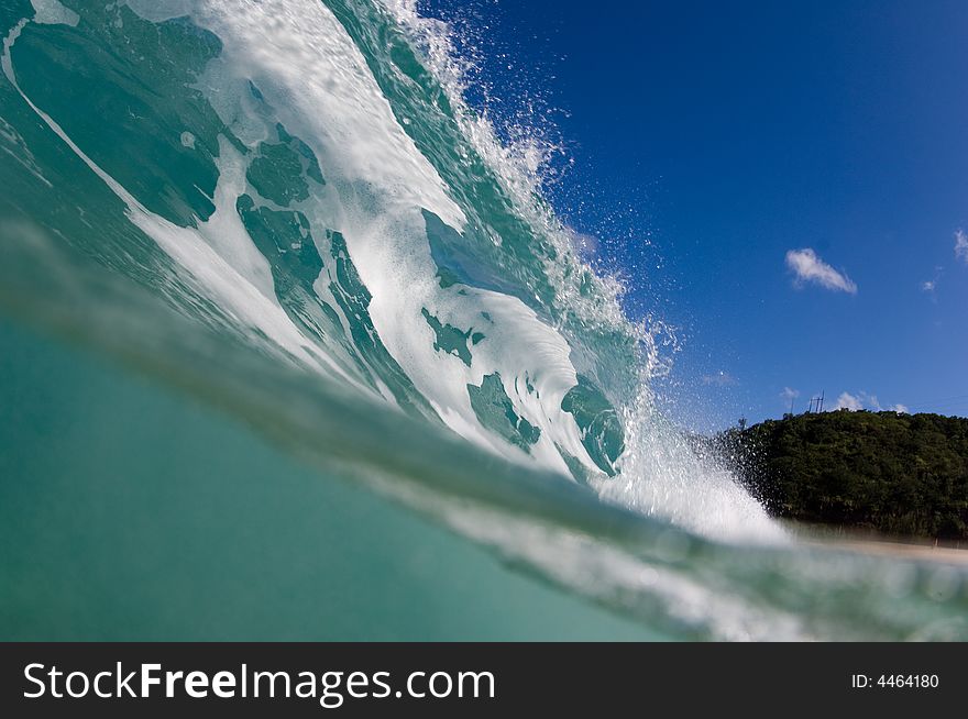 Giant wave breaking on the north shore of oahu. Giant wave breaking on the north shore of oahu