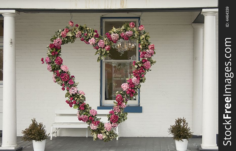 A wreath of flowers in the shape of a heart. Perfect for Valentine's Day. A wreath of flowers in the shape of a heart. Perfect for Valentine's Day.