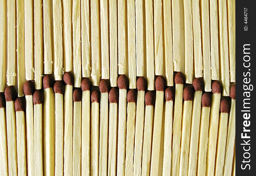 A box of matches arranged next to each other to form a pattern.