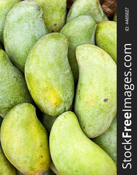 Green mangos for sale at rural market