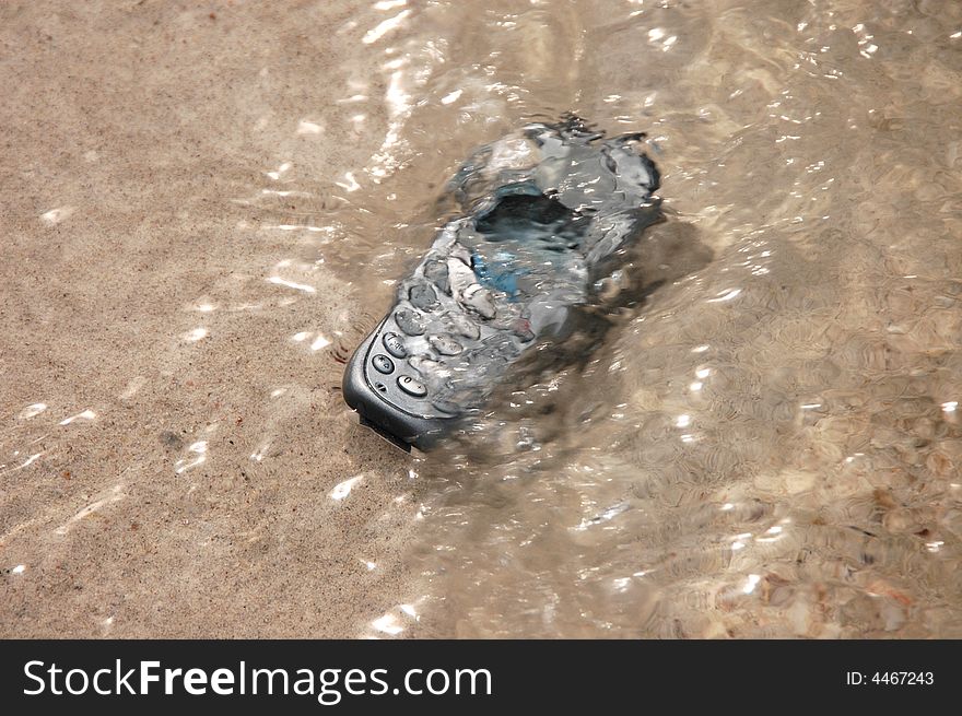 Cellphone on the water. beach