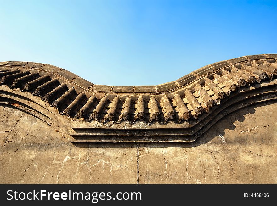 Wall ruins against blue sky