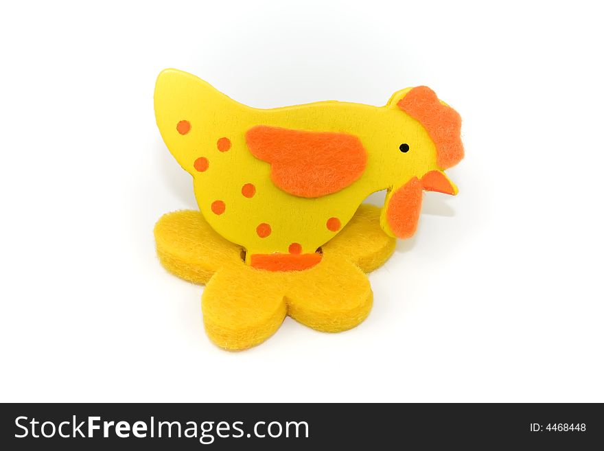 One small toy chicken a over white background