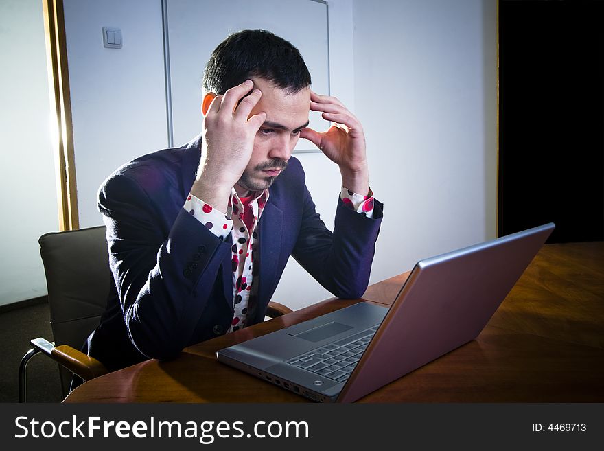 Businessman concentrating on his work. Businessman concentrating on his work.