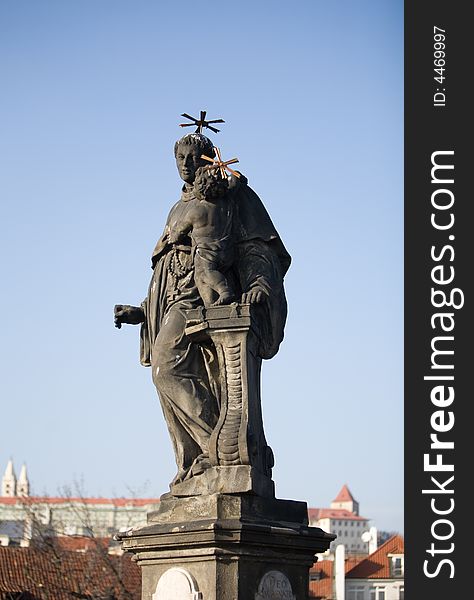 A statue on charles bridge, prague, the czech republic. A statue on charles bridge, prague, the czech republic